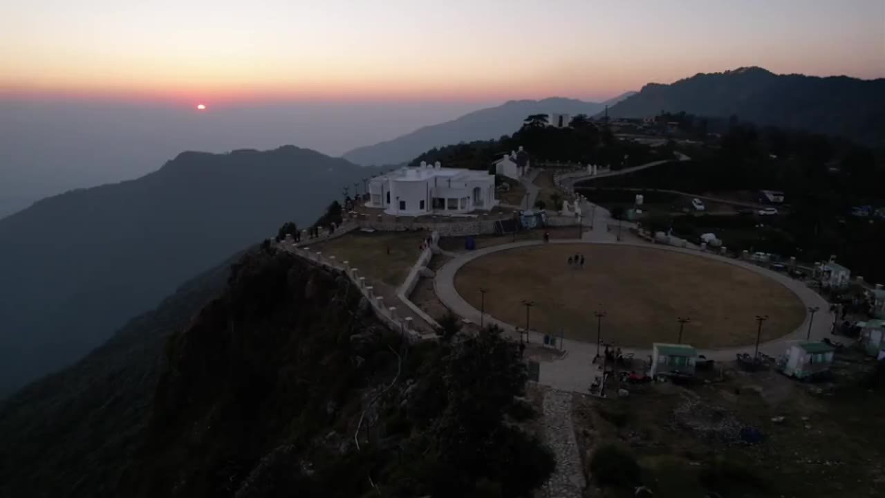 Sunset over a mountain-top estate